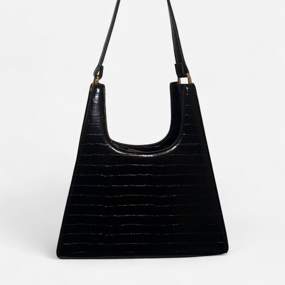 Used black faux croc leather